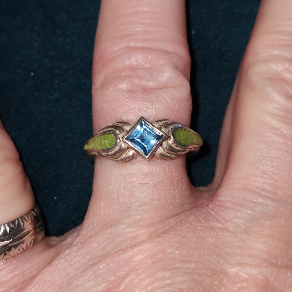 Blue topaz and green opal ring